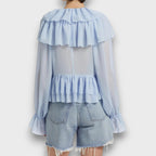 Elorie – Playful Ruffle Blouse with Retro Flair